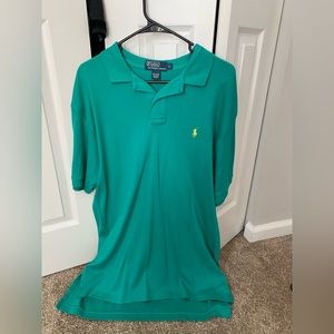 Men’s Ralph Lauren Polo size large, gently worn. Turquoise with yellow horse.